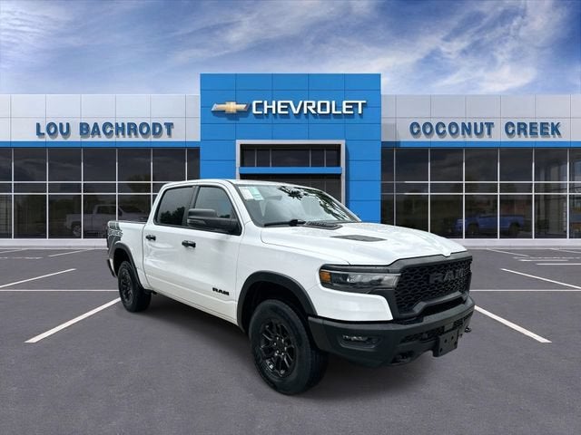 2025 RAM 1500 Rebel in Bright White Clea — front three-quarter view