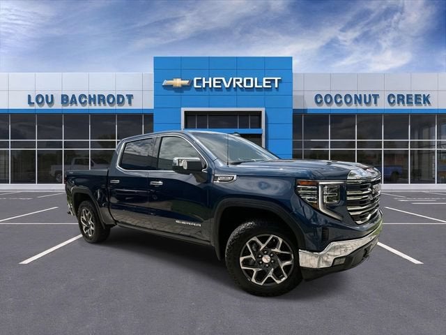 2022 GMC Sierra 1500 SLT in Pacific Blue Metallic — front three-quarter view