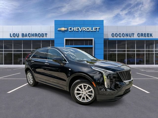 2023 Cadillac XT4 Luxury in Stellar Black Metallic — front three-quarter view