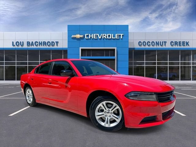 2023 Dodge Charger SXT in Torred Clearcoa — front three-quarter view