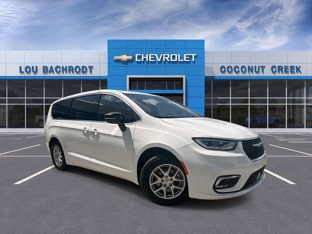2024 Chrysler Pacifica Touring in Bright White Clea — front three-quarter view