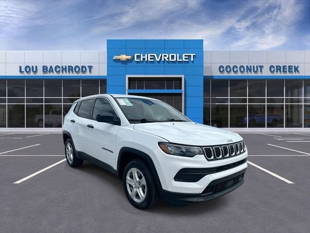 2023 Jeep Compass Sport in Bright White Cl — front three-quarter view