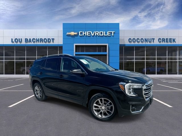 2024 GMC Terrain SLT in Ebony Twilight Metallic — front three-quarter view