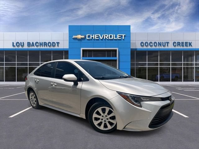 2024 Toyota Corolla LE in Classic Silver Me — front three-quarter view