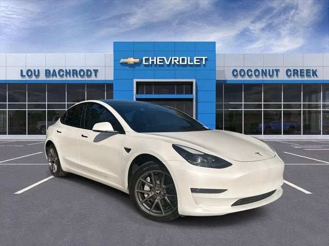 2023 Tesla Model 3 4DR RWD in White — front three-quarter view