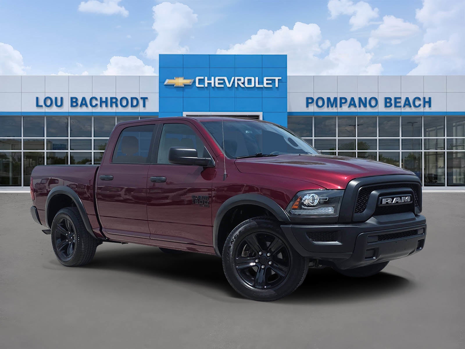 2024 RAM 1500 Classic Warlock in Delmonico Red P — front three-quarter view