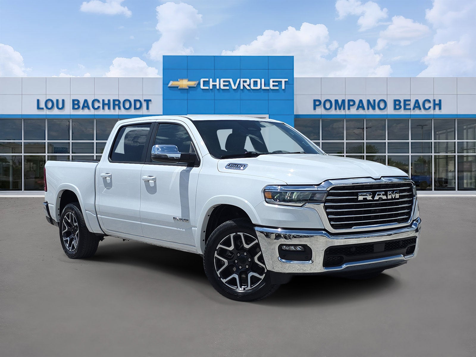 2026 RAM 1500 Laramie in Bright White Cl — front three-quarter view